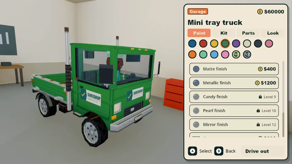 Choosing a paint finish for a green mini tray truck in the garage.