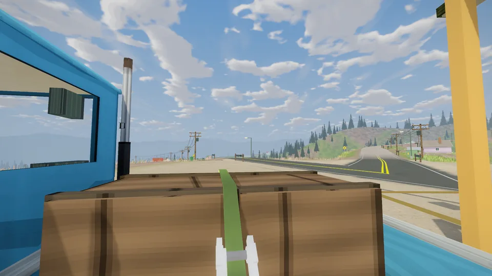 First-person view over a crate load on the tray with a green strap ready to tie down.